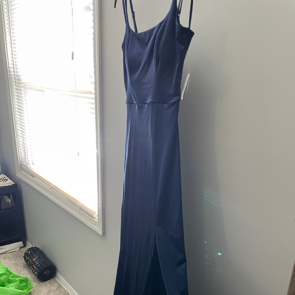 Blue long dress with sexy back. M. New